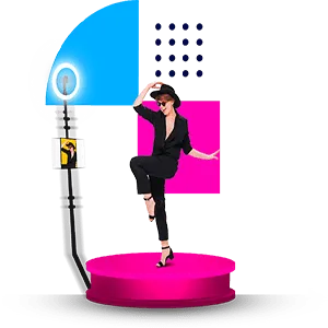 360 Photo Booth Rental Experience Person spinning on a bright pink platform inside a 360 video booth, captured mid-rotation with blue and magenta geometric shapes illustrating the 360-degree recording capability