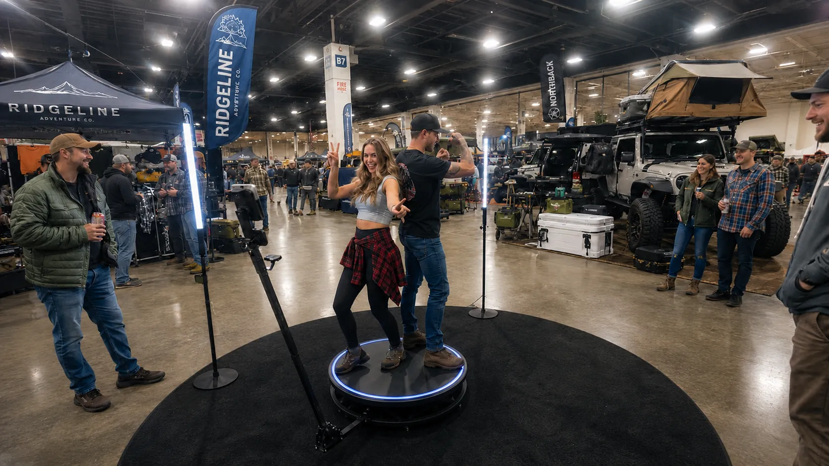 360 Video Booth for Trade Show Attendee Engagement | OutSnapped Trade show attendees using a 360 video booth at an off-road automotive industry exhibition