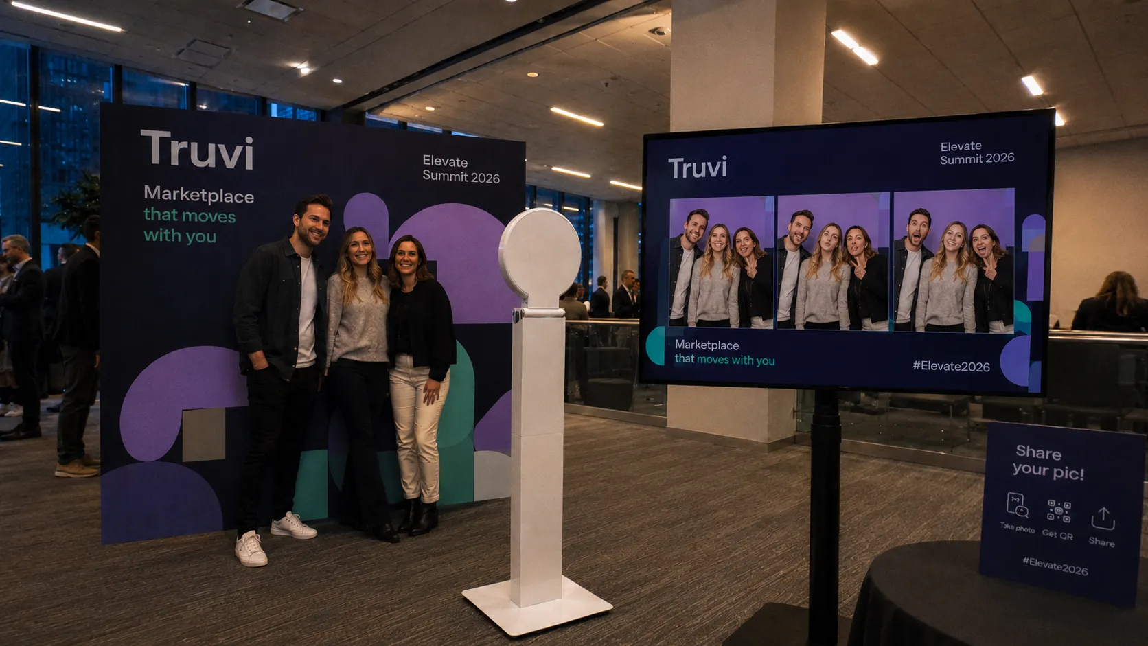 Conference Photo Booth with Live Branded Photo Gallery Conference photo booth activation with a large digital screen displaying branded attendee photo outputs