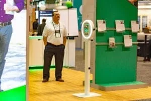 Citizens Bank trade show booth setup with attendant and display