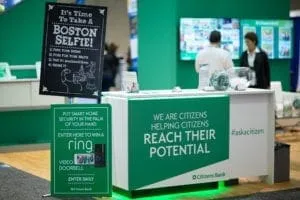 Citizens Bank branded photo booth with green display at trade show event