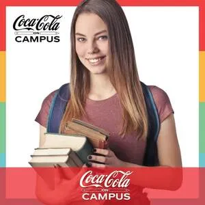 College student with books and backpack near Coca-Cola Campus branding