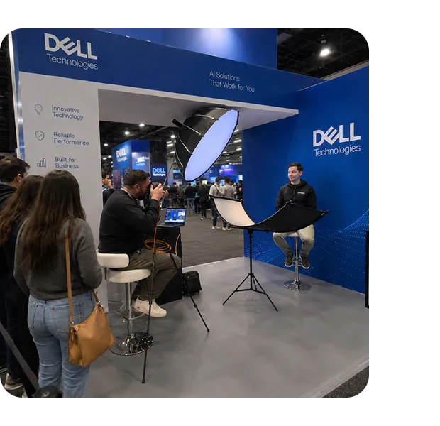 Dell Technologies branded photo experience Dell Technologies brand activation booth at trade show with two attendees being photographed by professional lighting setup