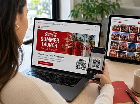 Woman holding tablet displaying OutSnapped digital marketing campaign with QR code for photo booth access, laptop showing campaign gallery in background