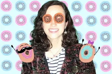 OutSnapped Donut AR Filter Photo Capture Woman with donut-eye AR filters and decorative donut accessory props smiling