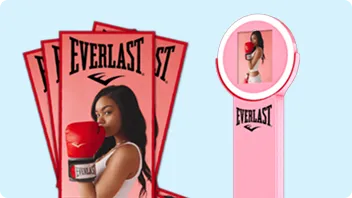 Everlast-branded photo cards and pink ring-light selfie station showing a woman kissing a red boxing glove