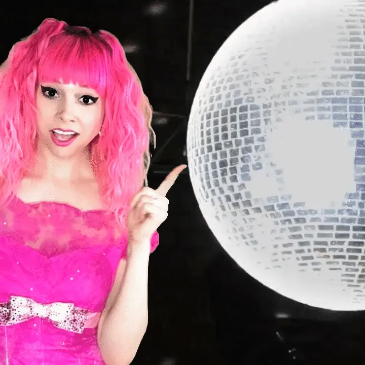 Green Screen Photo Booth with Props Woman with pink wig posing with disco ball prop