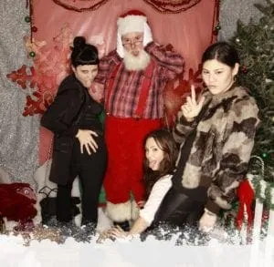 Group with Santa at holiday photo booth session