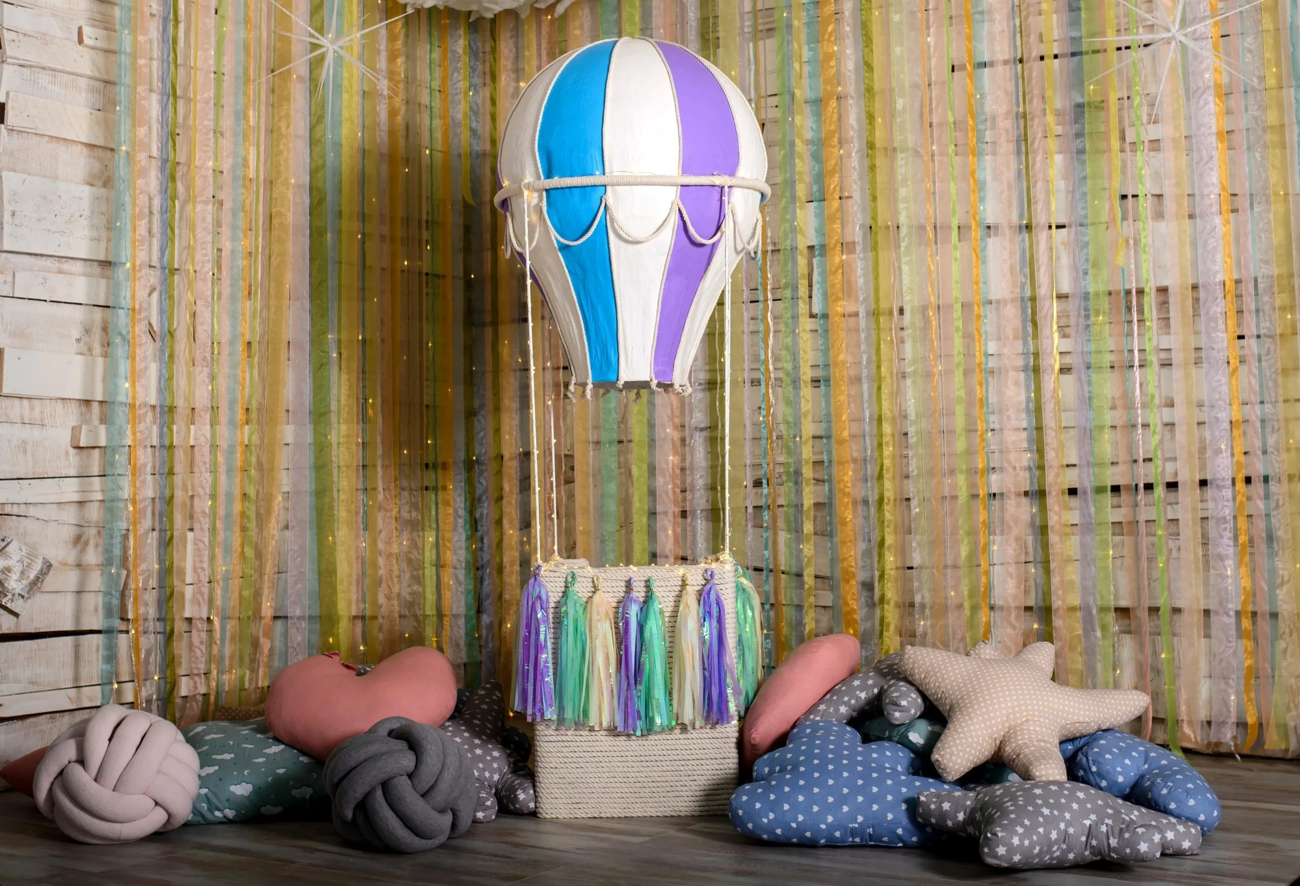 Colorful Hot Air Balloon Photo Booth Backdrop Hot air balloon and tassel garland photo booth backdrop with cushion props