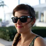 Lauren Margolis - Testimonial Headshot Woman wearing black sunglasses in outdoor setting