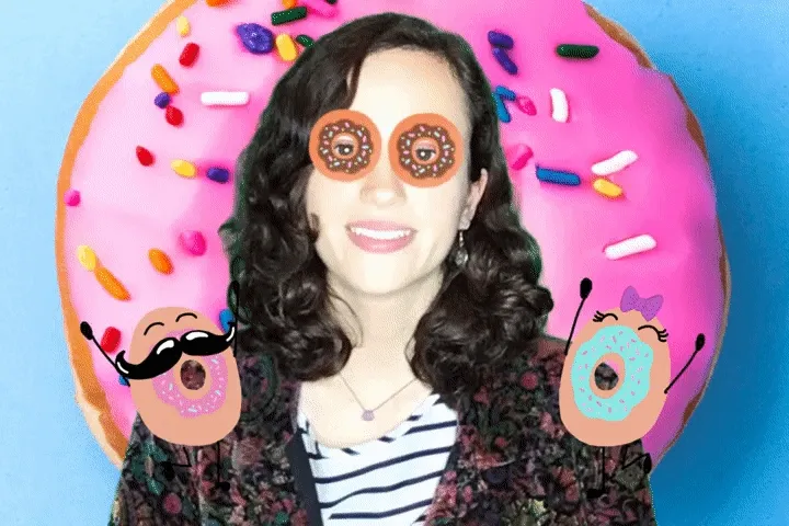 360 Donut Photo Booth Experience Woman wearing oversized donut-shaped sunglasses and playful donut props against a giant pink frosted donut backdrop with colorful sprinkles