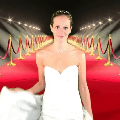 Red Carpet Glam Photo Booth Backdrop Woman in white dress and floral crown posing on red carpet photo booth backdrop