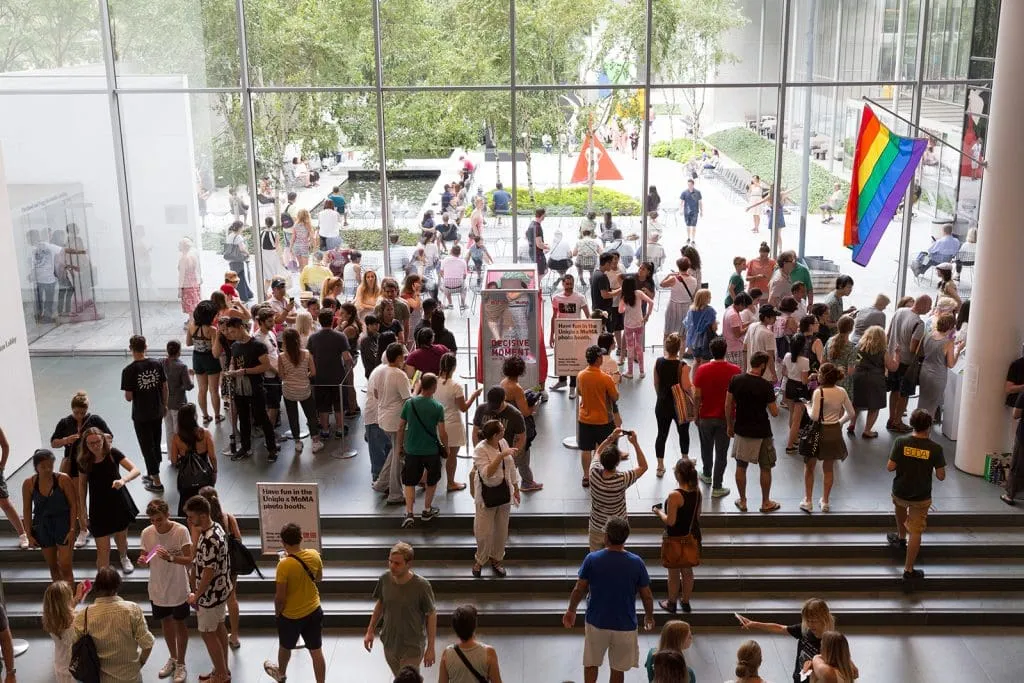 Busy Retail Activation with Event Attendees Large crowd gathering in modern retail space during a brand activation event