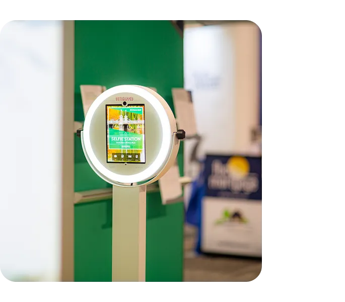 Selfie Station Interactive Mirror Interactive selfie station display with LED ring light and photo filter interface