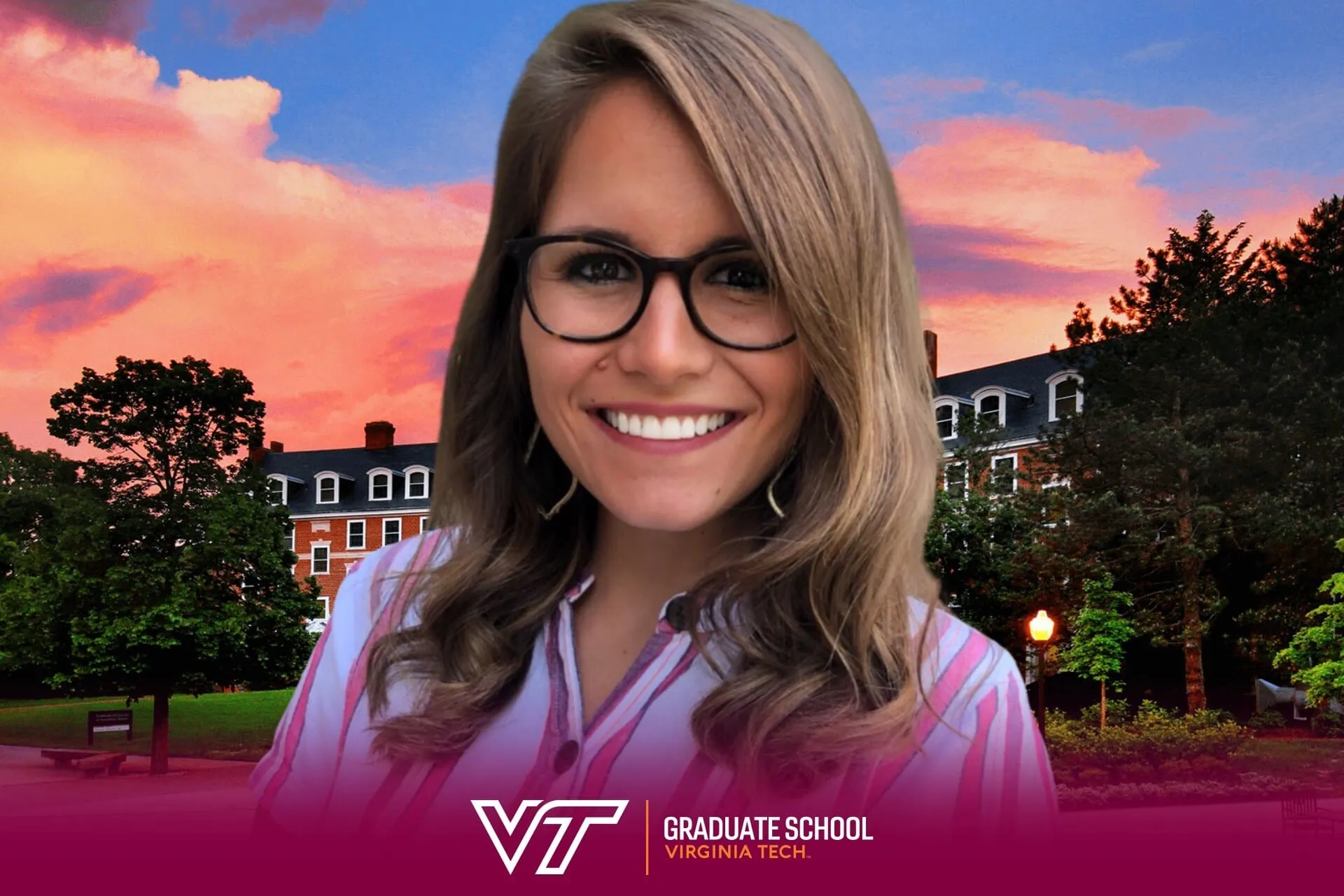 Woman smiling with glasses at Virginia Tech Graduate School campus backdrop