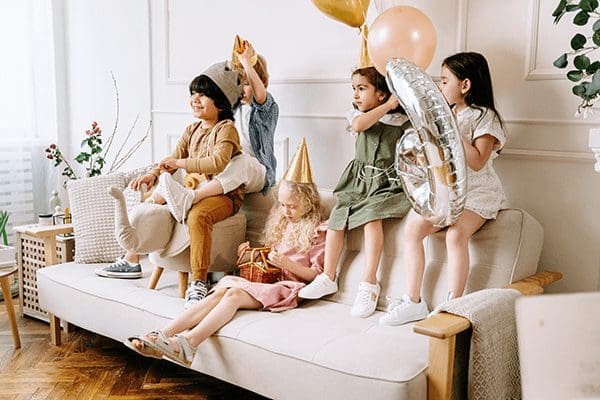 Kids posing for a photo op in a kids party